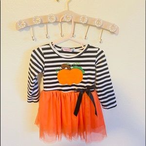 Adorable pumpkin dress with tulle skirt